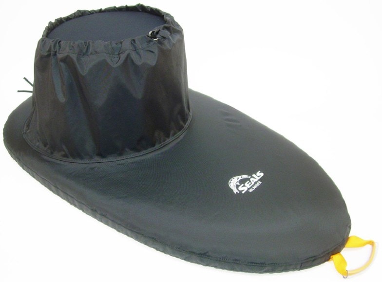 Close-up of the Inlander 2.2 spray skirt secured on a kayak cockpit during lake paddling
