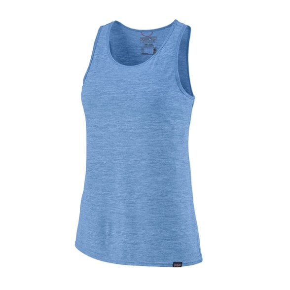 Patagonia women's Cool Daily tank top in action during a summer hike, showcasing its lightweight design.