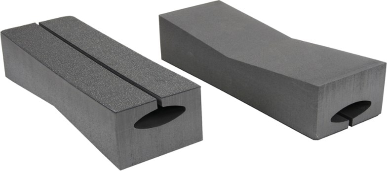 Foam kayak blocks fitting over roof rack bars for kayak transport