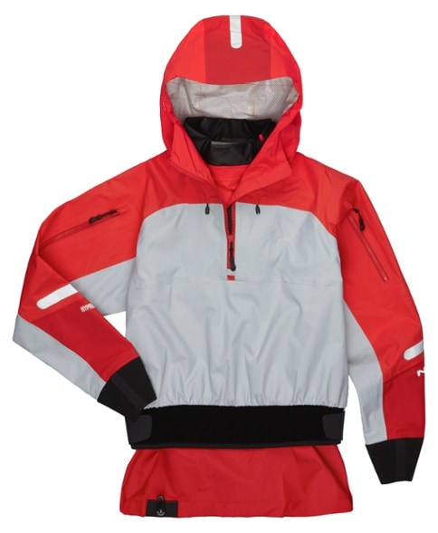 NRS Women's Riptide jacket in action on the water, showcasing its waterproof features.