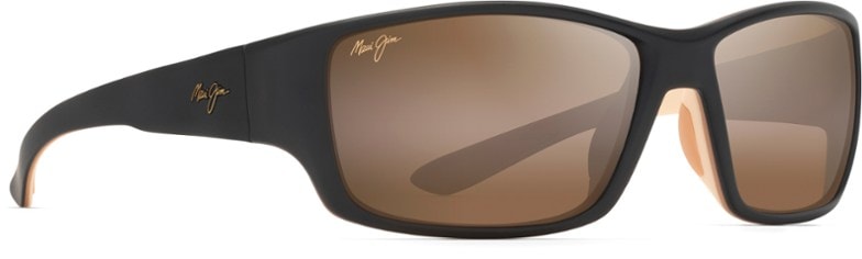 Maui Jim Local Kine polarized sunglasses modeled outdoors, showcasing bronze lenses and wrap-frame design