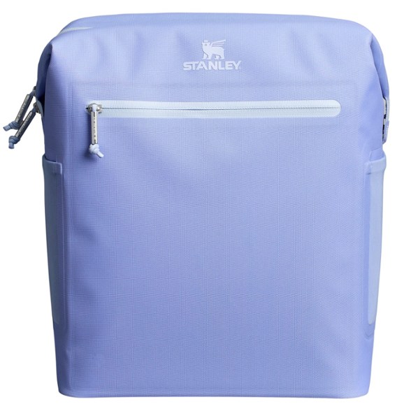 Stanley cooler backpack in vibrant color, fully packed with cans and ice packs for a picnic
