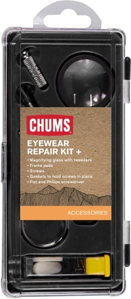 Close-up of a portable glasses repair kit with screwdrivers and spare parts