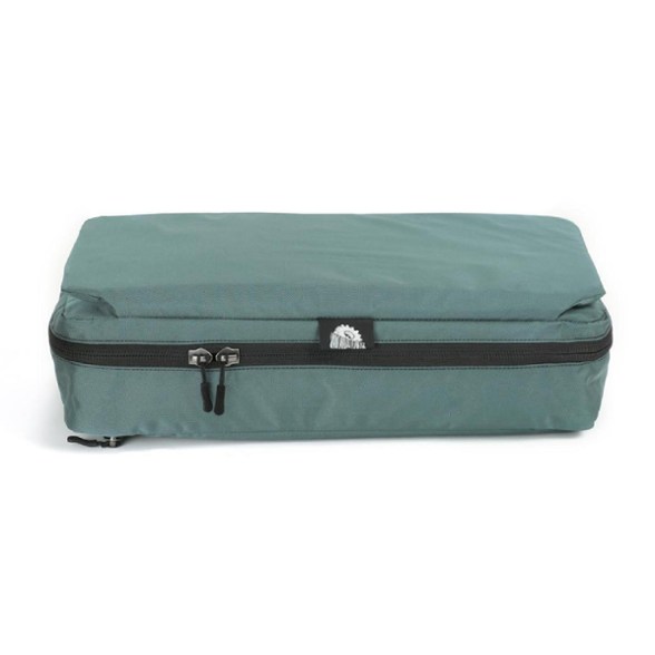Padded canoe seat pack attached under a canoe seat, showcasing waterproof storage