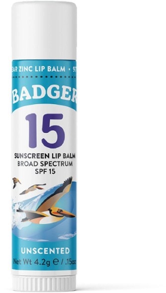 Close-up of SunKissed Organic SPF 15 Mineral Lip Balm tube, highlighting its smooth texture and protective qualities.