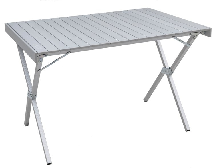 TrailCore XL aluminum folding table set up at a campsite with chairs surrounding it