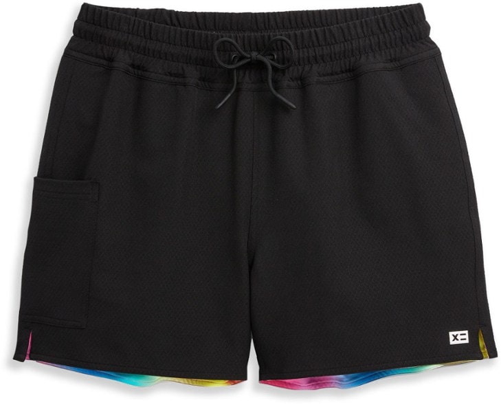 Close-up of reversible women's board shorts showing the fabric texture and color options
