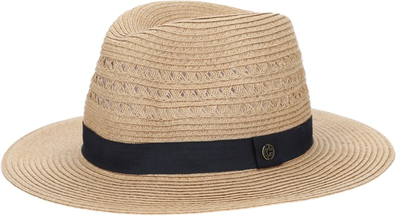 Woman wearing a pastel packable sun hat at the beach