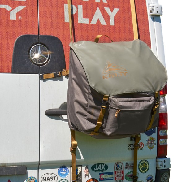 Eco-friendly camping trash bag carrier mounted on an SUV, showcasing its durable design and easy access.