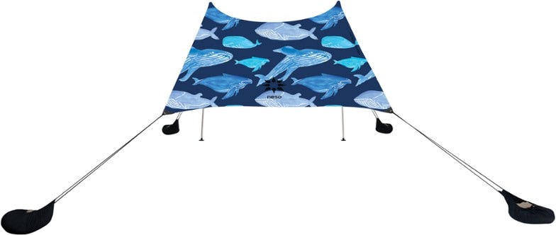 EcoShield UPF 50 Beach Sunshade with cooler pocket set up on a sandy beach