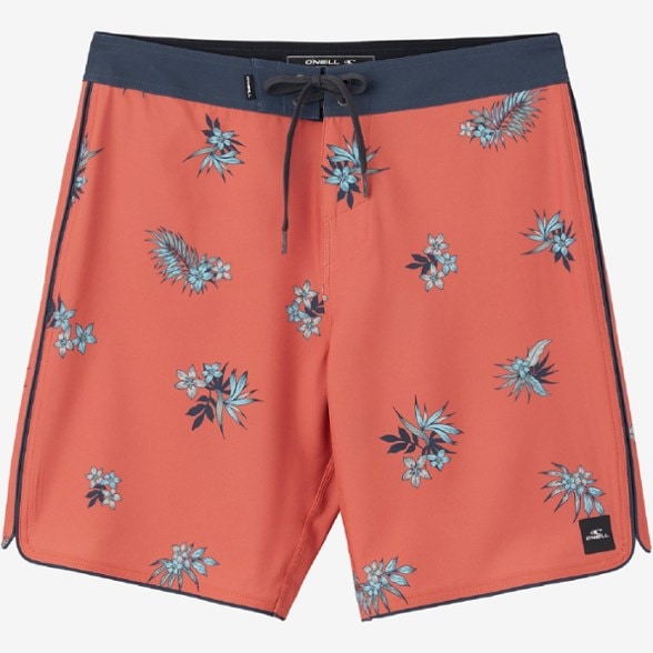 O'Neill Hyperfreak Mysto Surf Shorts displayed on a surfboard, highlighting the scallop hem and stretch fabric.