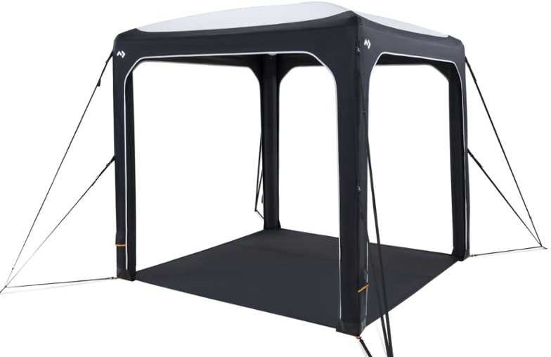 Dometic HUB 2 REDUX inflatable tent set up beside a car, showcasing its spacious interior