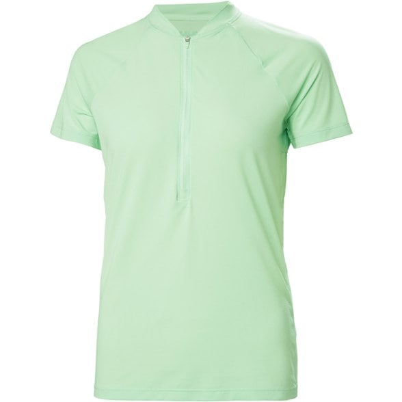 Woman wearing a blue Helly Hansen Siren half zip quick dry t-shirt, smiling on a sailboat deck.