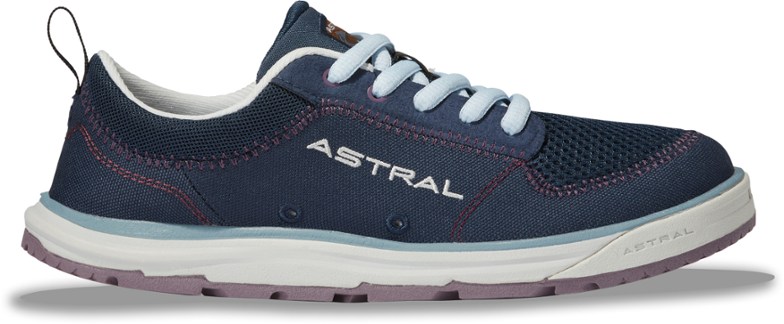 Astral Brewess 2.0 water shoes in action on a kayak, showcasing their grip and quick-drying capabilities.
