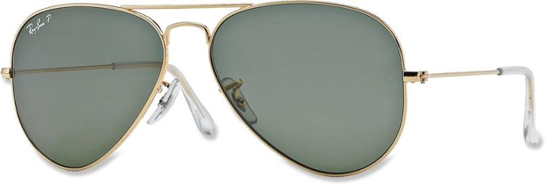 Front angle of Ray-Ban aviator sunglasses showcasing crystal green polarized lenses and gold metal frame