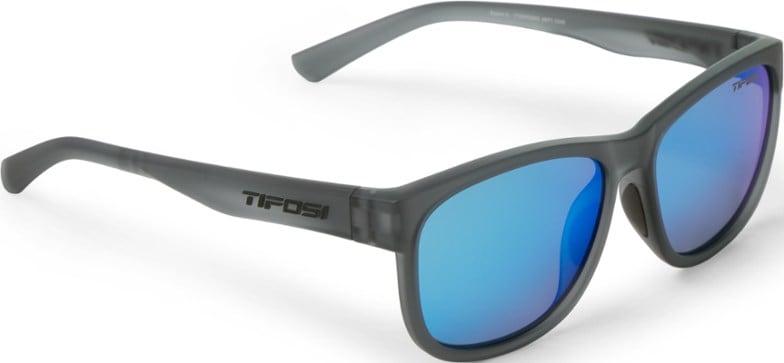 Tifosi Swank XL polarized sunglasses in action during a beach outing, showcasing UV protection.