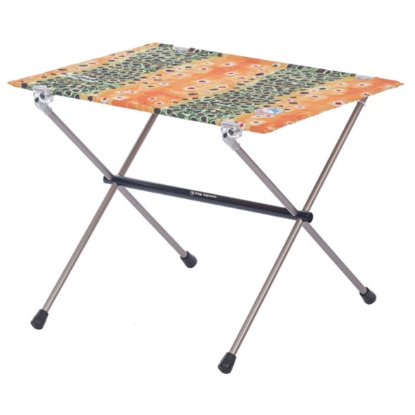 Big Agnes Woodchuck camping table assembled in a forest setting, perfect for outdoor meals