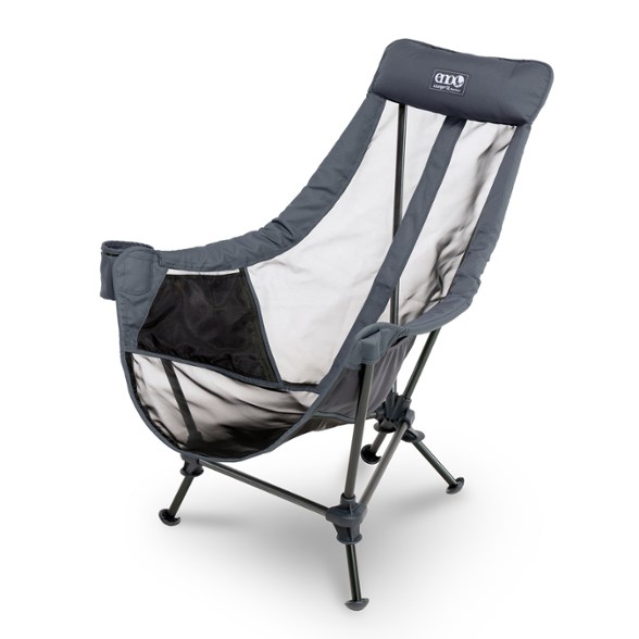 Side view of the ENO ComfortPlus Lounge Chair set up with a stunning mountain backdrop, highlighting its lightweight mesh design.