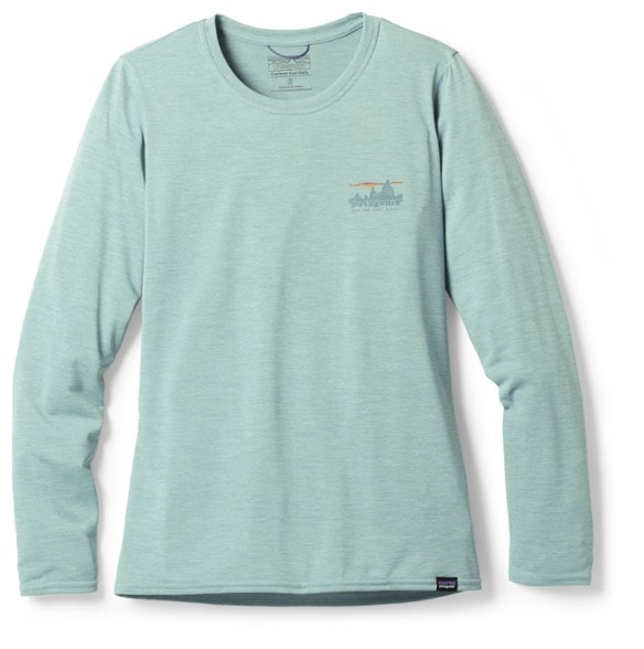 Patagonia Women's Long Sleeve Performance Shirt in blue, ideal for running and outdoor activities.