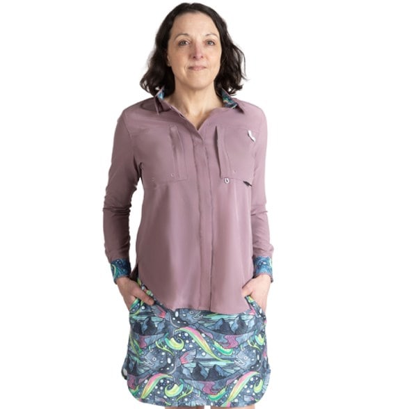 Women's fishing shirt with UPF 50+ sun protection and moisture-wicking fabric, perfect for river adventures