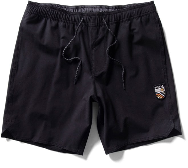 Close-up of VISSLA men's volley board shorts with scalloped hem and embroidered patch