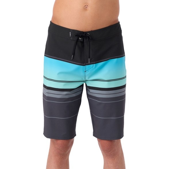 O'Neill Hyperfreak men's surf shorts in action, showcasing quick-dry technology
