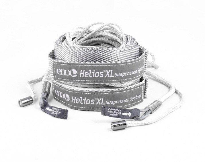 Close-up of ultralight hammock suspension system featuring tree-friendly straps and microtune adjustment knob, ideal for backpacking.