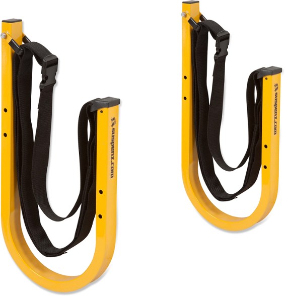 Wall-mounted SUP rack holding a paddle board with adjustable straps