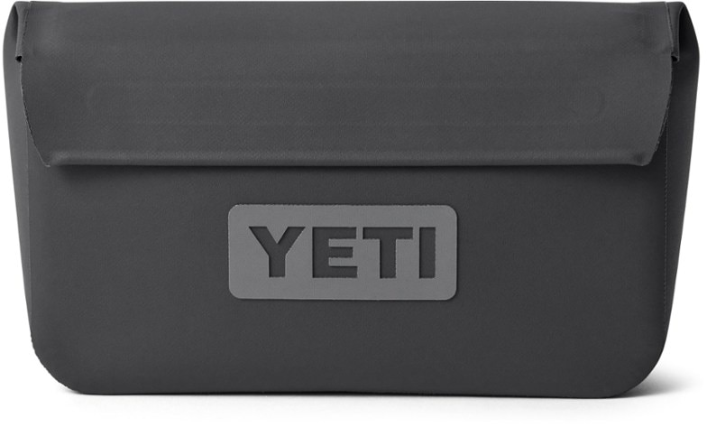 Close-up of TrailSeal magnetic waterproof pouch attached to YETI Hopper, showing magnetic closure detail