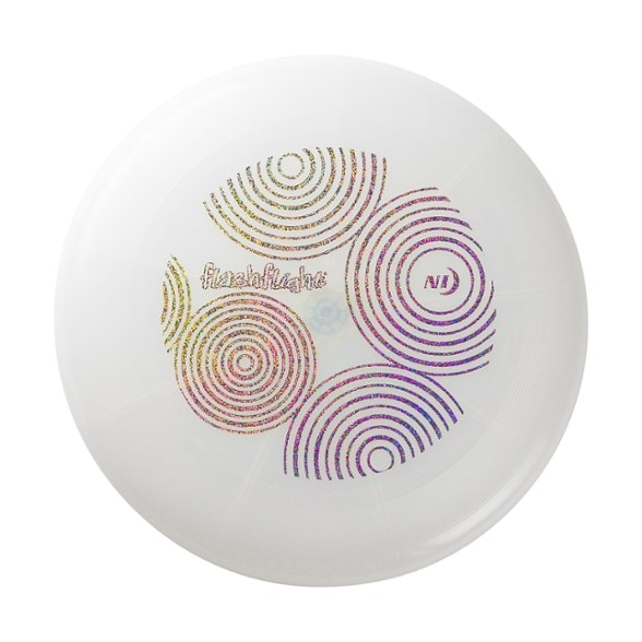 LuminaFly LED Flying Disc in flight at night, showcasing its glow in the dark feature