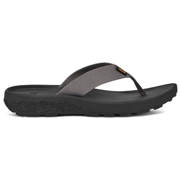 Men wearing Hydratrek flip-flops on rocky riverbank, showcasing grip on wet surfaces