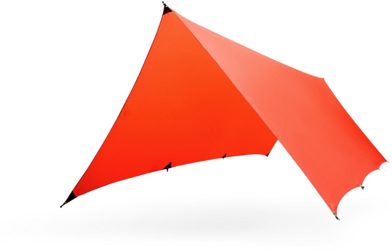 Kammok Kuhli ultralight shelter setup under trees showing its spacious coverage for camping gear.