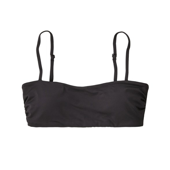 Close-up of sunrise-colored bandeau swim top with adjustable straps and removable cups