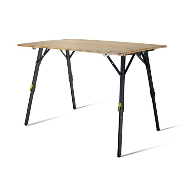 Kitpac Pro camping table with bamboo surface set up for a meal in the woods.
