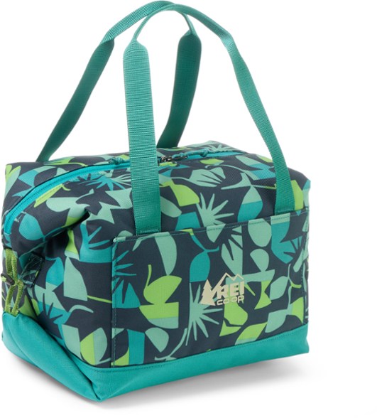 Campwell 8L foldable cooler in cube mode, packed with drinks for a campsite