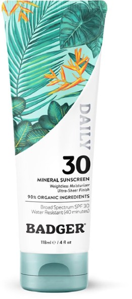 Close-up of Badger Daily SPF 30 mineral sunscreen tube highlighting organic ingredients and zinc oxide formula