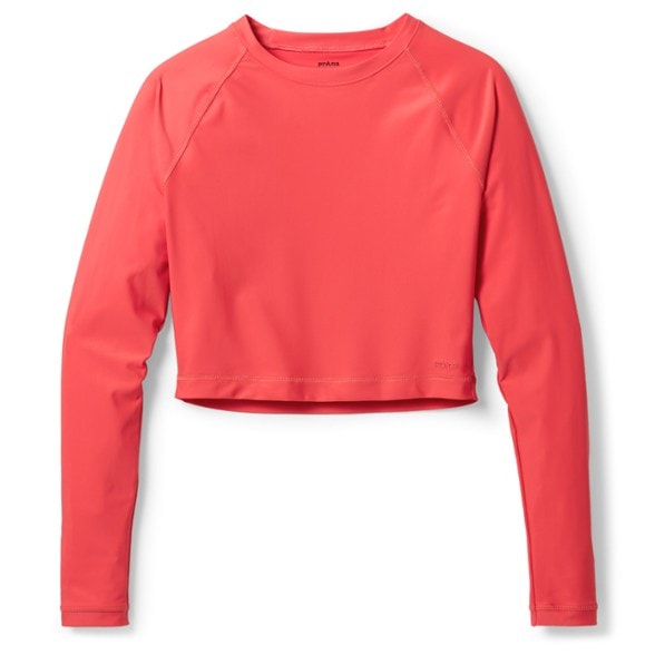 Woman wearing Baja Bound UPF 50 rashguard while surfing