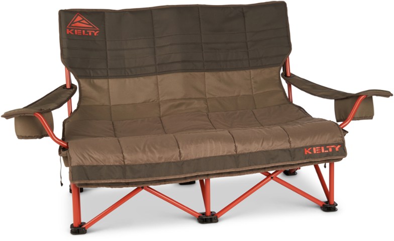 Camping loveseat with storage and blankets in use at a campsite