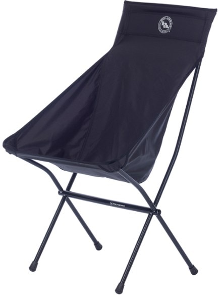 Relaxing in our comfortable camping chair with cup holder at the campsite