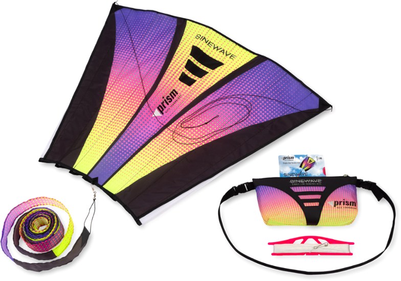 Side view of Breezeline Classic Single Line Kite flying above coastal dunes, ideal for flying kites on the beach.