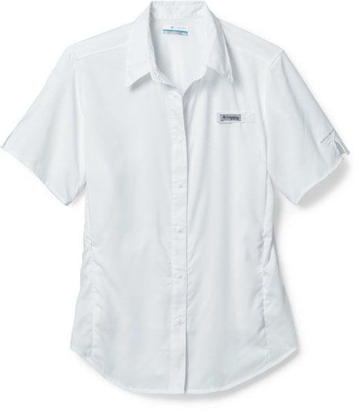 Columbia Women's PFG Tamiami II Fishing Shirt in action at a scenic lake.