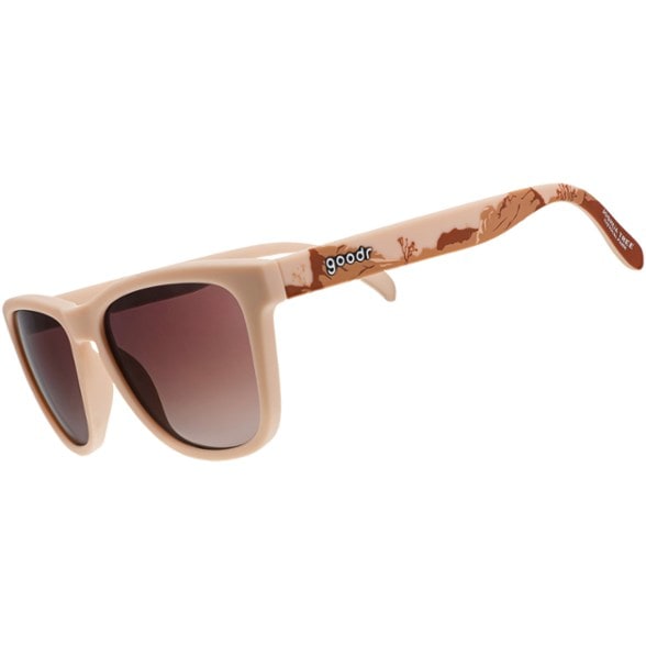 Close-up of Joshua Tree sunglasses with tan frames and gradient lenses, showcasing UV protection features.