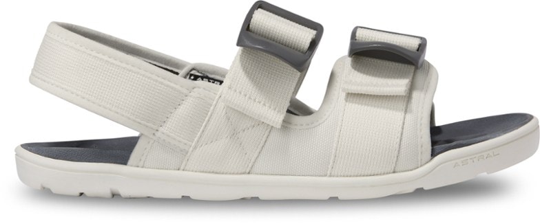 Astral Webber women's sandals on a rocky terrain, showcasing their grip and balance