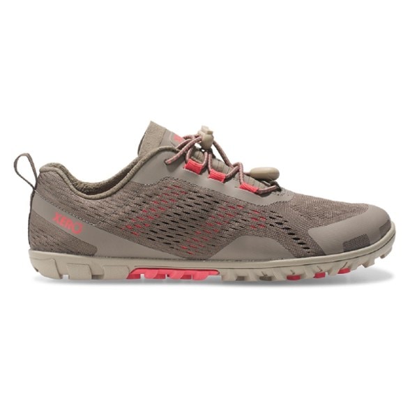 Side view of women's AquaSprint TerrainFlex water shoes on wet rocks near a hiking trail