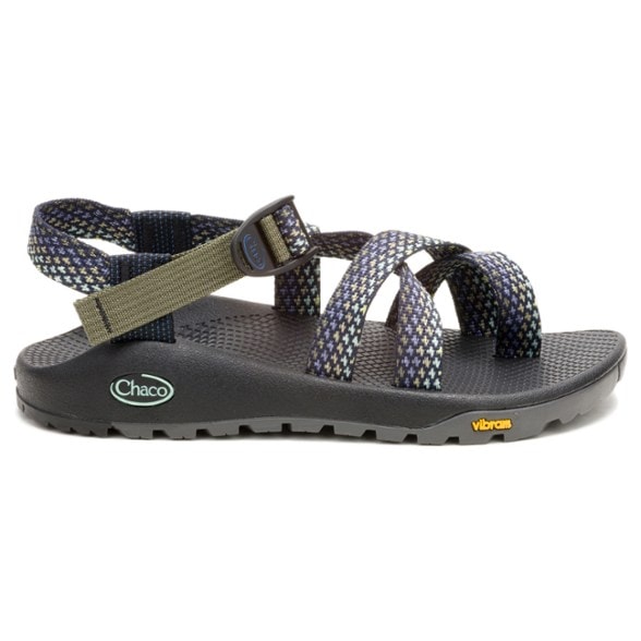 Chaco Rapid Pro women’s sandals on rocky riverbank, showcasing grip and durability