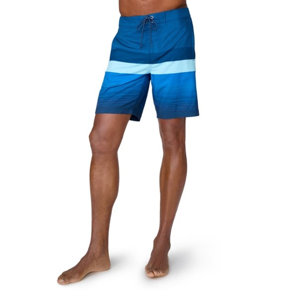 Front view of men's swim shorts showing color-block design and adjustable waistband