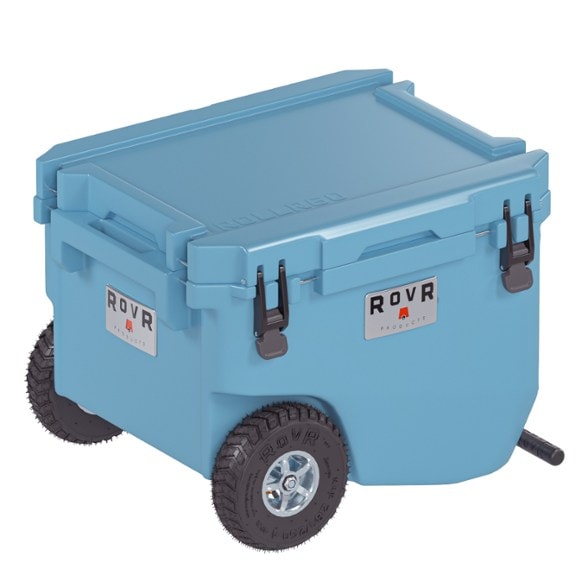 RollR 60 wheeled cooler in action on rocky terrain during camping trip