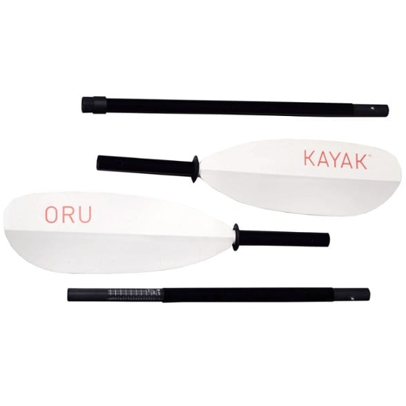 Oru Adventure Paddle showcasing its lightweight design against a scenic lake backdrop.