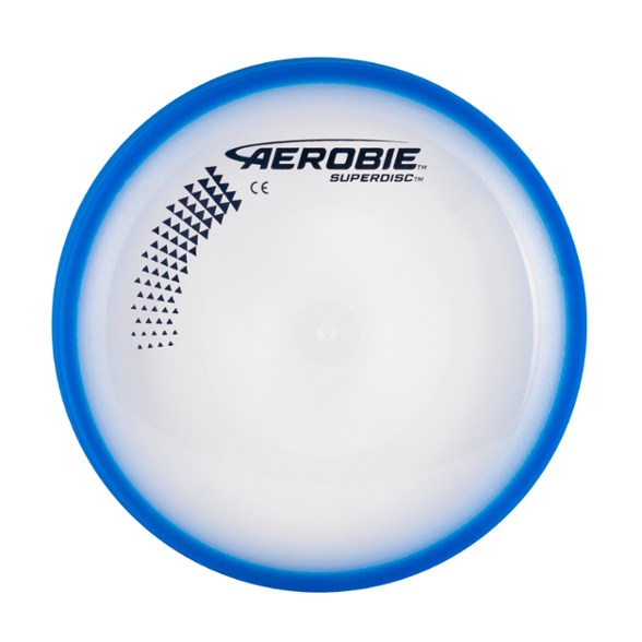 Aerobie Superdisc flying disc mid-flight during beach game