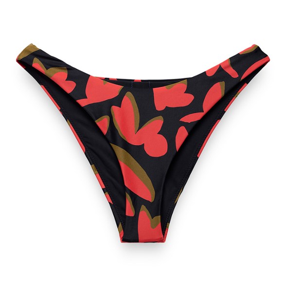 Women modeling cheeky swim bottoms by the pool